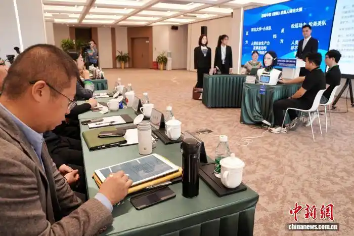 国内首届机器人辩论大赛决赛举行_机器人辩论赛决赛_首届中国(国际)机器人辩论大赛